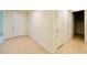 Hallway features tile flooring and access to other rooms at 2706 Vermillion Ct, St Cloud, FL 34771