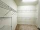 Spacious walk-in closet with ample shelving and storage at 2706 Vermillion Ct, St Cloud, FL 34771