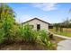 This home's exterior features a small front porch and a well-maintained yard at 2730 W Highland St, Lakeland, FL 33815