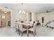 Dining room featuring a dining table set, tile flooring and an open concept design at 2929 Satire St, Kissimmee, FL 34746