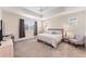 Serene main bedroom with tray ceiling, plush carpeting, and neutral décor at 2929 Satire St, Kissimmee, FL 34746