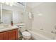 Cozy bathroom with tub and shower combination, classic vanity, and ample lighting at 2958 Willow Bay Ter, Casselberry, FL 32707