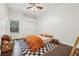 Bedroom with a ceiling fan, a patterned rug and natural light at 2958 Willow Bay Ter, Casselberry, FL 32707