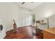 Bedroom featuring a guitar, a workspace and a hardwood floor at 2958 Willow Bay Ter, Casselberry, FL 32707