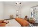 Comfortable bedroom featuring wood floors, natural light, and playful decor at 2958 Willow Bay Ter, Casselberry, FL 32707