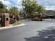 Gated community entrance with brick pillars and decorative phoenix emblem adding security and curb appeal at 2958 Willow Bay Ter, Casselberry, FL 32707