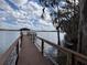 Scenic lake view with a private dock and gazebo perfect for relaxing and enjoying the waterfront at 2958 Willow Bay Ter, Casselberry, FL 32707