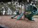 Community playground area featuring slides and swings for outdoor recreation at 2958 Willow Bay Ter, Casselberry, FL 32707