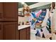 Bathroom features a vanity sink, cabinet and bathtub/shower with vibrant shower curtain at 30 Cornwall Ct, Casselberry, FL 32707