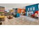 Spacious open living space with combined living and dining areas, tile flooring, and colorful decor at 30 Cornwall Ct, Casselberry, FL 32707