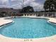 Community swimming pool providing a relaxing atmosphere and a refreshing escape from the heat at 3162 Sun Lake Ct # B, Kissimmee, FL 34747