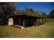 Covered patio providing ample seating, flower boxes and a space to relax outdoors at 4452 Fairview Ave, Orlando, FL 32804