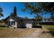 A bright, airy home with a new roof and attractive, neutral paint scheme surrounded by mature trees at 4452 Fairview Ave, Orlando, FL 32804