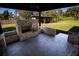 Outdoor kitchen including a brick grill and seating area, perfect for enjoying the outdoor views and activities at 4452 Fairview Ave, Orlando, FL 32804