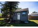 Exterior view of newly constructed shed with windows and ample space for outdoor storage at 4452 Fairview Ave, Orlando, FL 32804