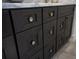 Elegant bathroom vanity with dark wood cabinets and brushed nickel hardware at 4452 Fairview Ave, Orlando, FL 32804