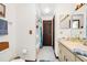 Bright bathroom featuring a vanity with sink and cabinetry, along with tiled floors and a shower-tub combination at 4826 S Saint Brides Cir, Orlando, FL 32812