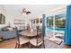 Cozy dining area with a view of the pool through sliding glass doors at 4826 S Saint Brides Cir, Orlando, FL 32812