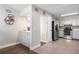 Modern kitchen area with stainless steel appliances and a pass through to living area at 509 Shane Cir, Winter Springs, FL 32708