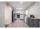 Bright kitchen with stainless steel appliances, white cabinetry, and modern tile backsplash at 509 Shane Cir, Winter Springs, FL 32708