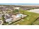 Aerial view of the community showcasing a pool, playground, and clubhouse for residents' enjoyment at 5095 Caspian St, St Cloud, FL 34771