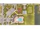 Aerial view of the community amenities, including a pool, playground, and parking, for a convenient lifestyle at 5095 Caspian St, St Cloud, FL 34771