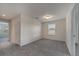 Light-filled bedroom with neutral carpeting and ample natural light from the window at 5095 Caspian St, St Cloud, FL 34771