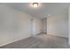 Spacious bedroom featuring neutral carpet and a ceiling light at 5095 Caspian St, St Cloud, FL 34771