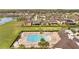 Aerial view of community pool and deck with lounge chairs, perfect for relaxation and socializing at 5095 Caspian St, St Cloud, FL 34771