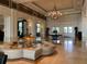 Opulent lobby featuring a stunning chandelier and decorative water feature at 7651 Whisper Way # 204, Reunion, FL 34747