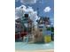 A fun-filled water park is made complete with engaging splash features and climbing structures for to enjoy at 7651 Whisper Way # 204, Reunion, FL 34747