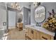 Bathroom featuring double vanities, modern fixtures, and stylish design at 807 Oak Shadows Rd, Celebration, FL 34747