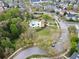 Aerial view of neighborhood pool featuring lush landscaping and a playground at 807 Oak Shadows Rd, Celebration, FL 34747