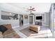 Comfortable living room with tiled floor, a ceiling fan and a sliding door to the backyard at 1043 Meller Way, Orlando, FL 32825