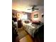 Bedroom with comfortable bed, soft lighting, and ample decorative accents at 11213 River Grove Dr, Orlando, FL 32817