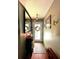 Cozy entryway featuring a decorative mirror and stylish lighting fixture at 11213 River Grove Dr, Orlando, FL 32817