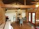 Open living room with wood flooring, high ceilings, and exposed wood beams at 11213 River Grove Dr, Orlando, FL 32817