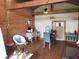 Living area boasting high ceilings, wood beams, and seating area at 11213 River Grove Dr, Orlando, FL 32817