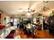 Open-concept living room and dining area with hardwood floors and natural light at 11213 River Grove Dr, Orlando, FL 32817