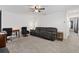 Spacious basement area with comfortable seating, a desk, and ample space for recreation at 1129 Blue Garden Dr, Deland, FL 32720