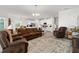 Spacious living room showcasing an open concept design with neutral paint and flooring at 1129 Blue Garden Dr, Deland, FL 32720