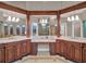 Beautiful bathroom with dual sinks, custom vanity, and a spa-like shower and tub at 11306 Bridge House Rd, Windermere, FL 34786
