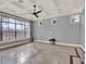 Bedroom with coffered ceiling, large windows, and tiled floors at 11306 Bridge House Rd, Windermere, FL 34786
