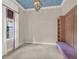 Spacious bedroom with a beautiful chandelier and built-in shelving and seating at 11306 Bridge House Rd, Windermere, FL 34786
