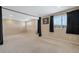 Large bonus room with neutral carpet, recessed lighting, and natural light from the window at 12189 Beach Fern Rd, Orlando, FL 32824