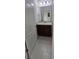 Bright bathroom features a modern vanity and neutral finishes at 15471 Honeybell Dr, Winter Garden, FL 34787