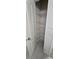 Linen closet features adjustable metal shelves at 15471 Honeybell Dr, Winter Garden, FL 34787