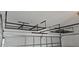 Garage overhead storage racks for maximum space and organization at 15471 Honeybell Dr, Winter Garden, FL 34787