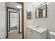 Bathroom showing vanity and partial view of shower and toilet at 170 Palmetto Woods Ct # 3A, Deltona, FL 32725