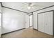 Neutral bedroom featuring closet and ceiling fan ready to be personalized to your taste at 170 Palmetto Woods Ct # 3A, Deltona, FL 32725